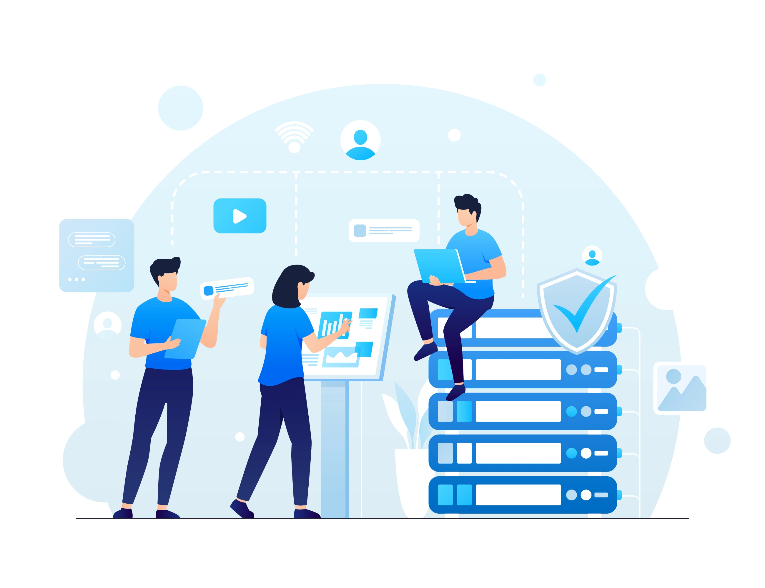 Happy, collaborative team working together on laptops.